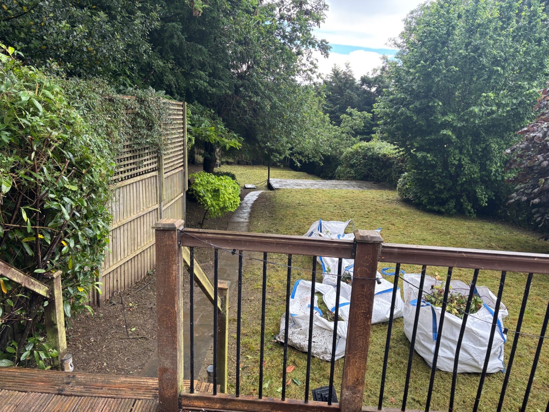 Lawn cut back, borders tidied and waste bagged for removal — after