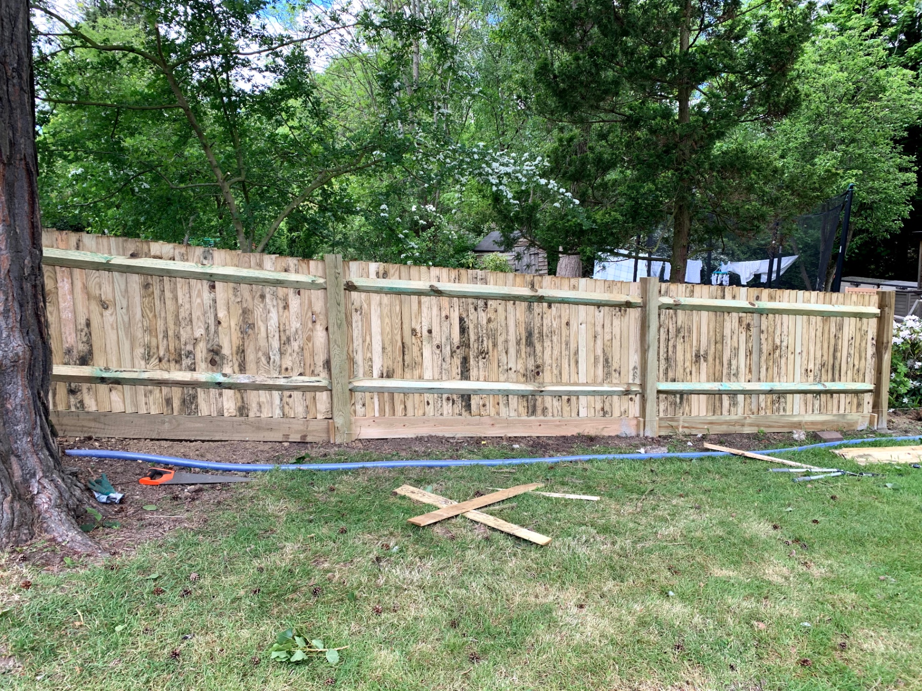 Run of closeboard fencing and gravel boards continued down the garden — Petts Wood fencing project by Gardner Contract Services