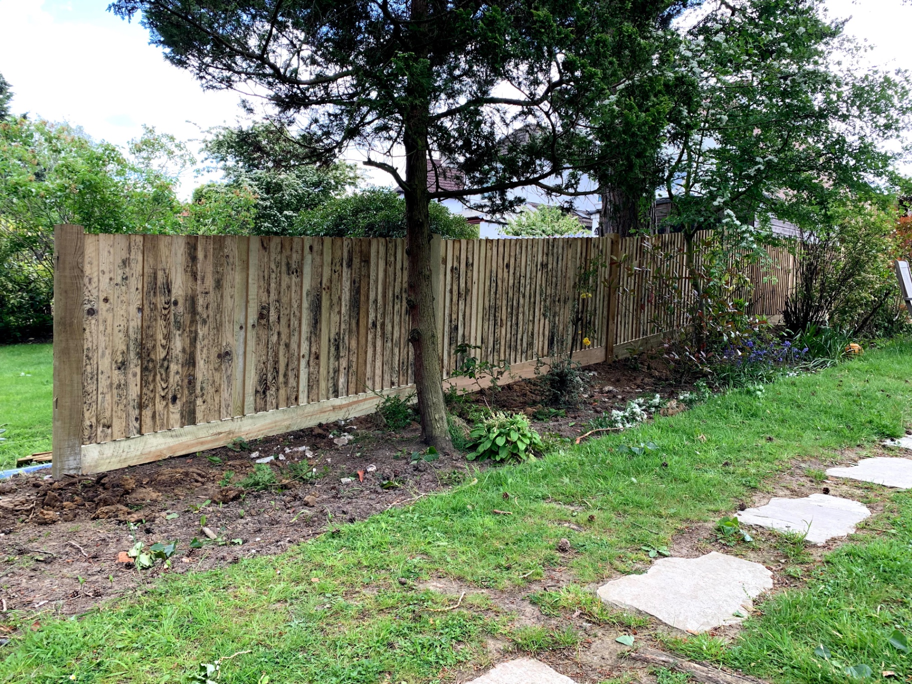Completed closeboard fence line through the rear garden — Petts Wood fencing project by Gardner Contract Services